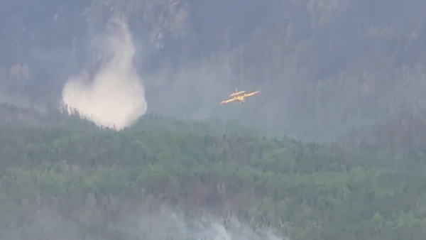 Video of CL415 water drop as seen from helicopter